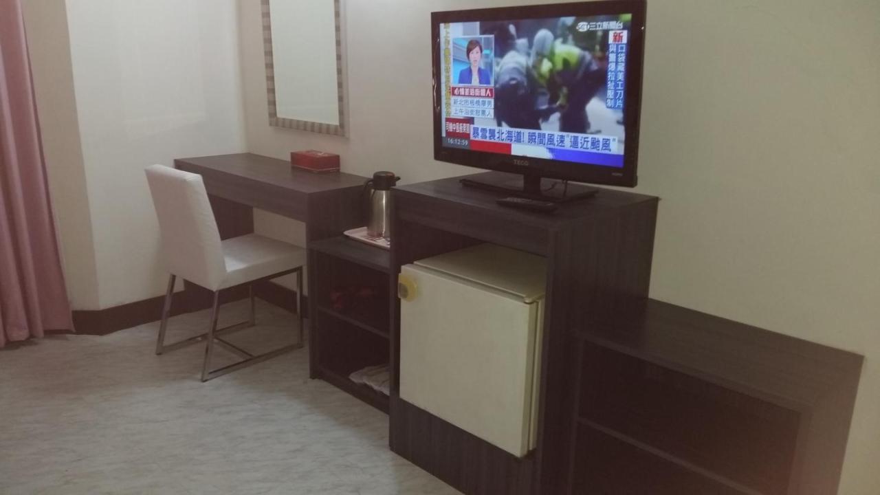 Modern Plaza Hotel Kaohsiung Quarto foto