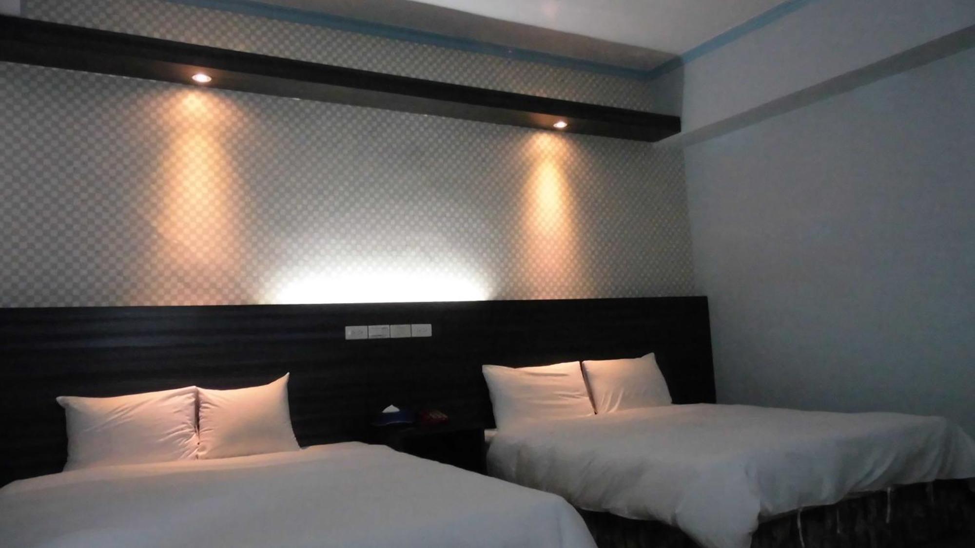 Modern Plaza Hotel Kaohsiung Quarto foto