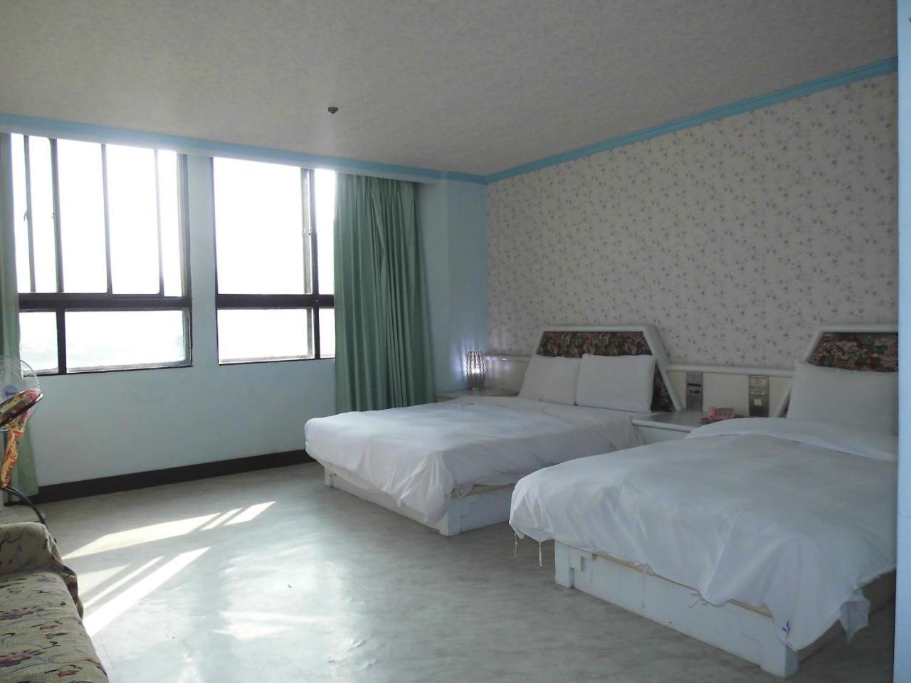 Modern Plaza Hotel Kaohsiung Quarto foto