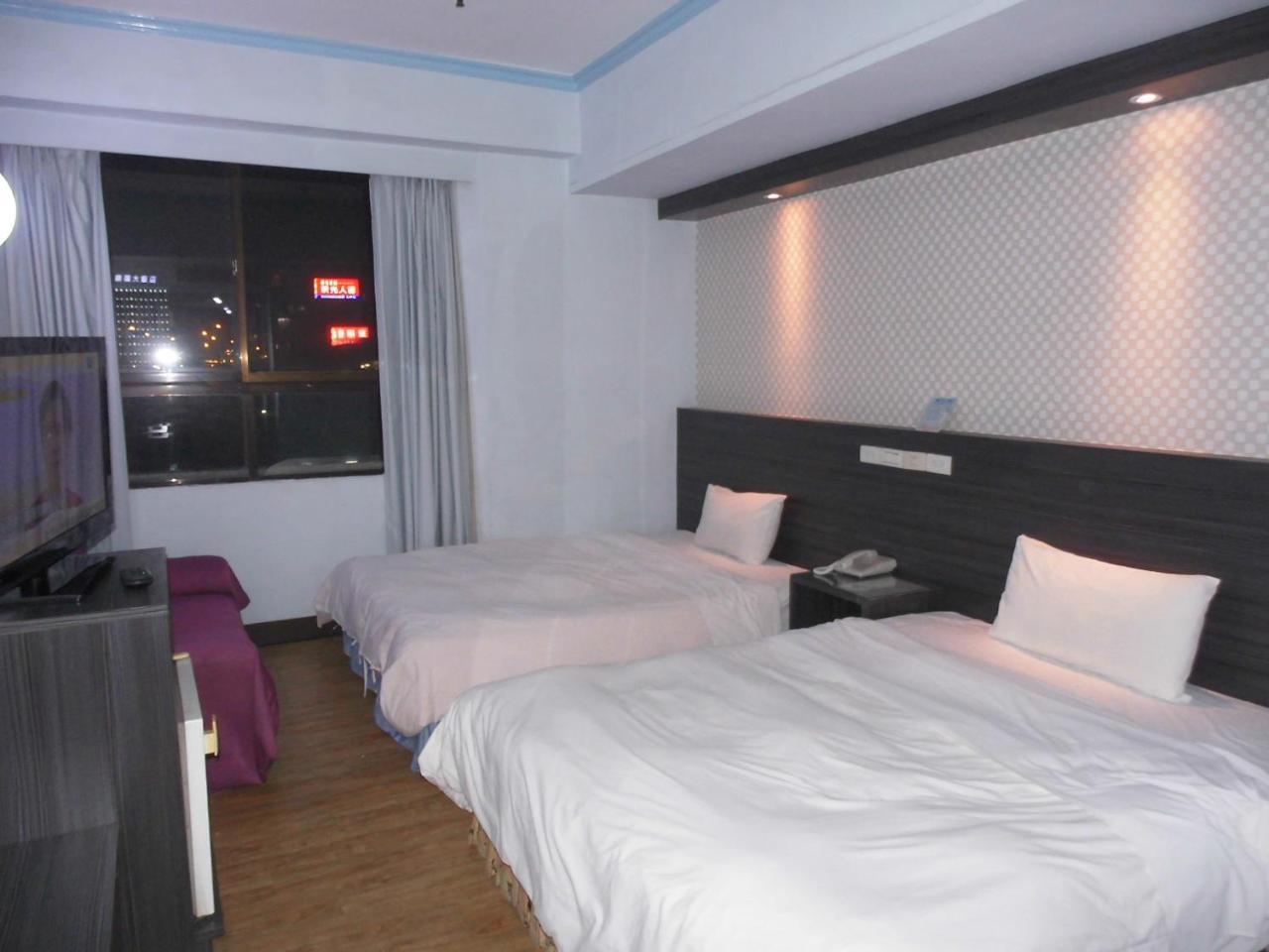 Modern Plaza Hotel Kaohsiung Quarto foto